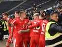 Tom Naylor celebrates his goal at MK Dons
