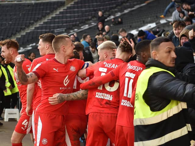 Tom Naylor celebrates his goal at MK Dons