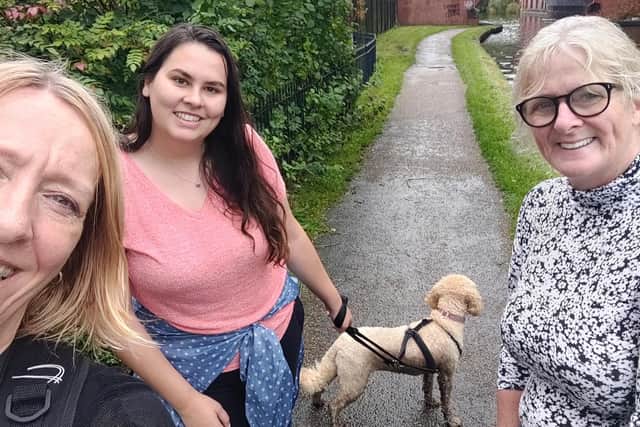 Bryonie Shaw, Kim Beardsmore and Bernardette Ashcroft reach Leigh as they complete their sponsored dog walk