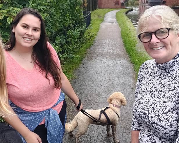 Bryonie Shaw, Kim Beardsmore and Bernardette Ashcroft reach Leigh as they complete their sponsored dog walk