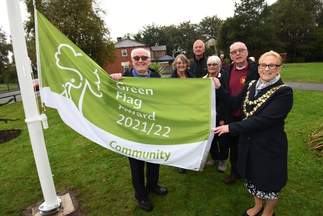Flashback: The former Mayor of Wigan Coun Yvonne Klieve, pictured with The Bridges Community group volunteers, who maintain Colliers Corner garden, off Lovers Lane, Howe Bridge, which has once again been awarded The Green Flag.