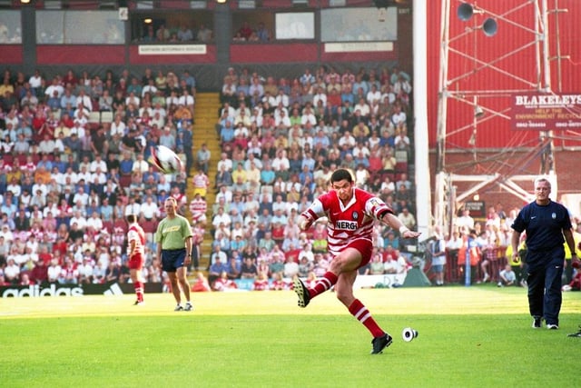 Andy Farrell kicks Wigan's last points at Central Park.