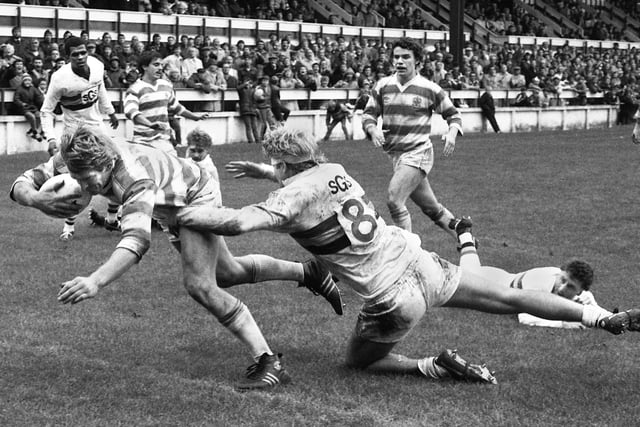 Wigan forward Graeme West plunges over for a try against Bradford Northern in a league match at Central Park on Sunday 11th of September 1983.
Wigan lost 16-24.