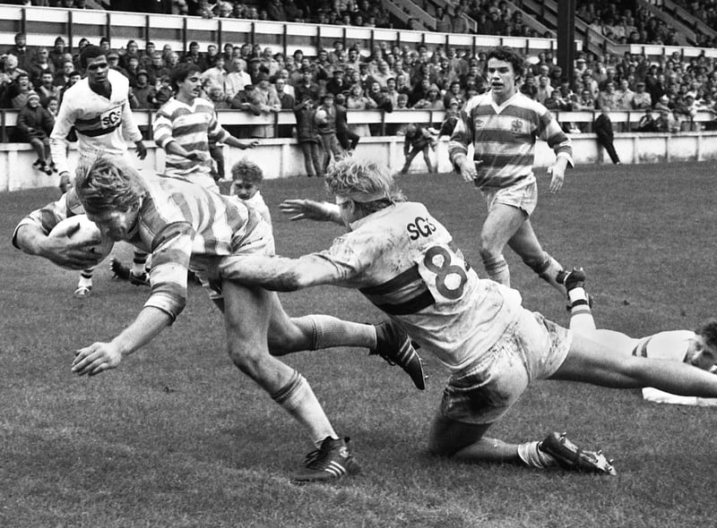 Wigan forward Graeme West plunges over for a try against Bradford Northern in a league match at Central Park on Sunday 11th of September 1983.
Wigan lost 16-24.