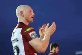 Liam Farrell applauds the travelling Wigan Warriors fans at Castleford Tigers
