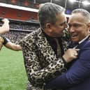 Leigh owner Derek Beaumont's & head coach Adrian Lam celebrate Challenge Cup final victory over Hull KR at Wembley