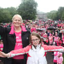 Special guest cancer survivor Katie Norris with her daughter Zoe, nine, starting the Race for Life