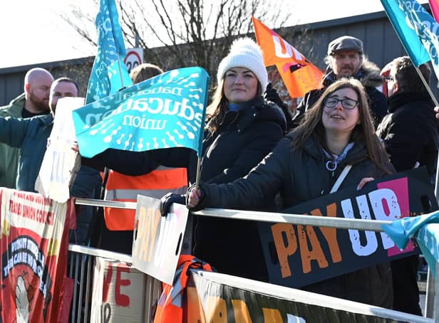 Teachers, members of the National Education Union and supporters on a picket line near Fred Longworth High School, Tyldesley, last month