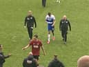 Ashley Fletcher leaves the field for the last time as a Latics player, after breaking his arm against Millwall
