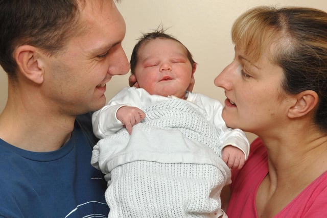 Catherine and Mark Hardy, from Whelley, with their daughter, born at 6pm on January 1, 2011, weighing 8lb 1oz