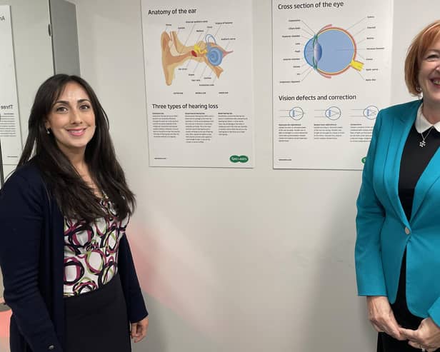 Yvonne Fovargue (right) pictured with Lois Beatty, Store Manager of Specsavers, Ashton-in-Makerfield (left)