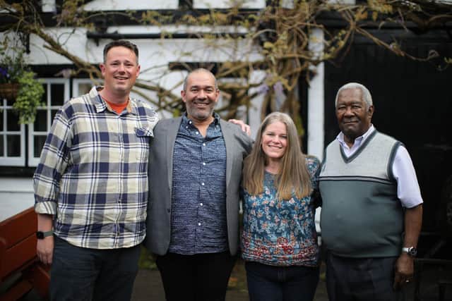 Pictured: Searcher Roy (2nd right) reunited with his sister Jo (3rd right) and brother Dan (left) joined by Roys father Eccelston (4th right). (C) Wall To Wall