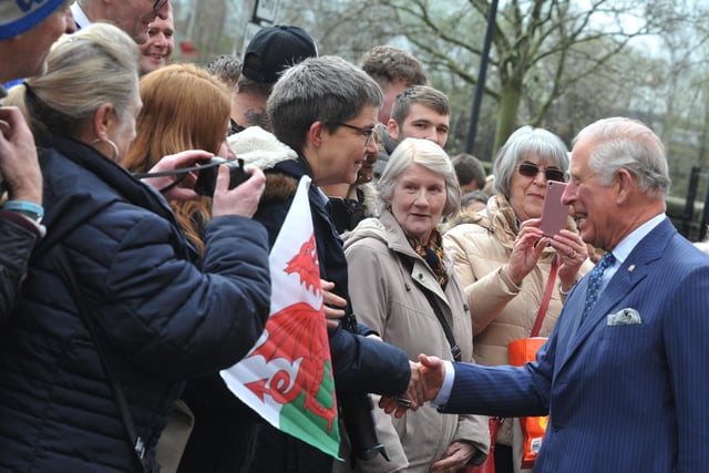 Prince Charles meets the crowds of people outside The Old Courts, Wigan, April 2019.