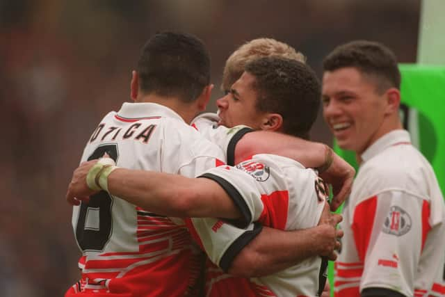 Jason Robinson celebrates scoring in the 1995 final