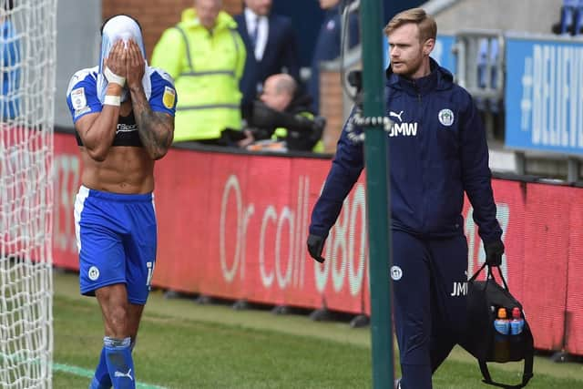 Curtis Tilt limps off against Bolton