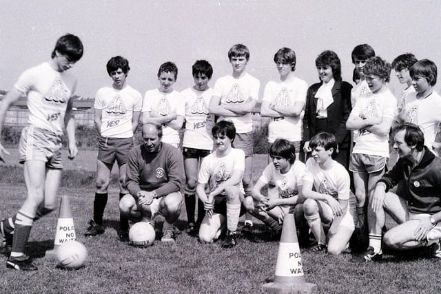 Retro 1982 - Man Utd soccer legend Bobby Charlton encourages youngsters during his summer soccer school in Wigan