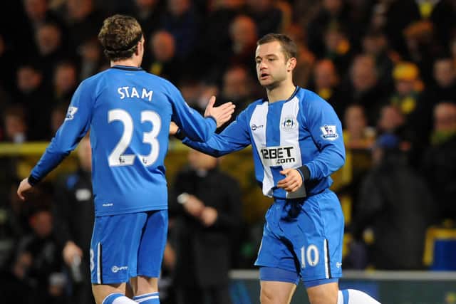 Ronnie Stam celebrates with Shaun Maloney at Norwich in December 2012