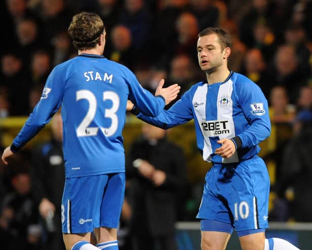 Ronnie Stam celebrates with Shaun Maloney at Norwich in December 2012