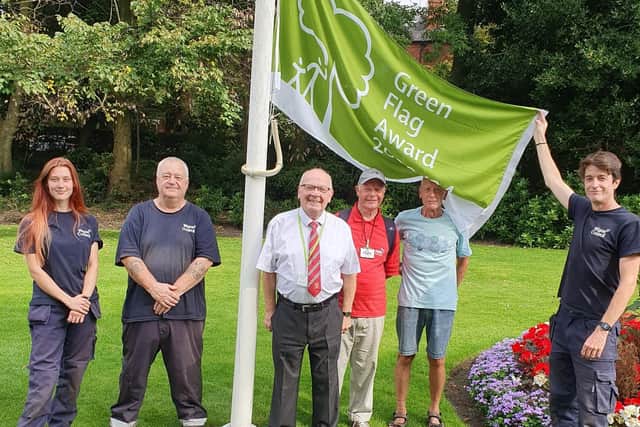 The Green Flag is raised at Wigan's Mesnes Park