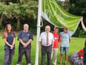 The Green Flag is raised at Wigan's Mesnes Park