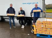 Wigan Council's HAF team take delivery of 7,000 cans of spaghetti hoops