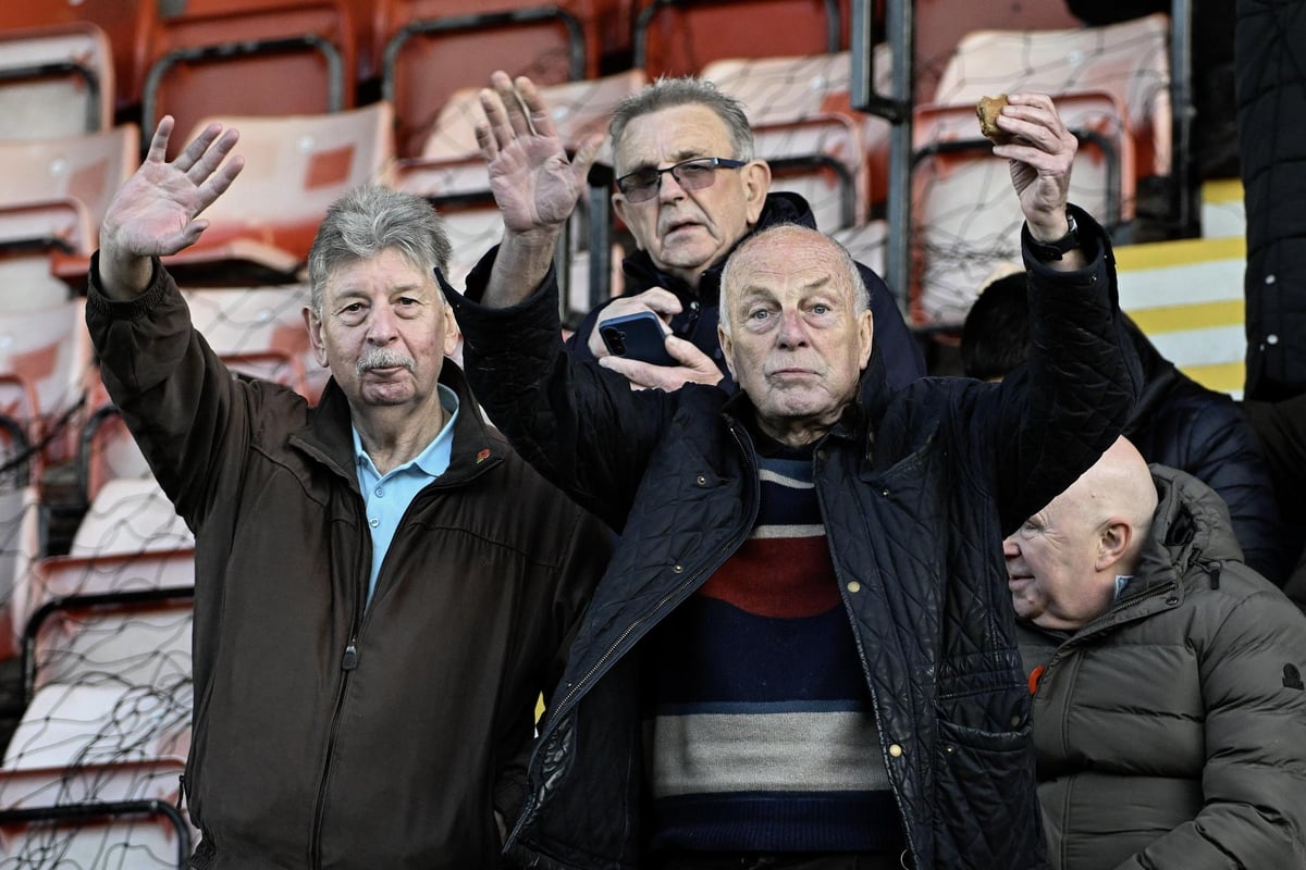 Are YOU in our 30-strong Wigan Athletic fans gallery from Exeter City?