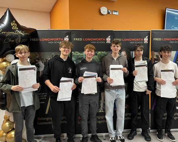 Fred Longworth High pupils James Hollingswort, Tom Costello, Sean Courtney, Adam Vallaley, Isaac Roberts and Jack Smith with their GCSE results