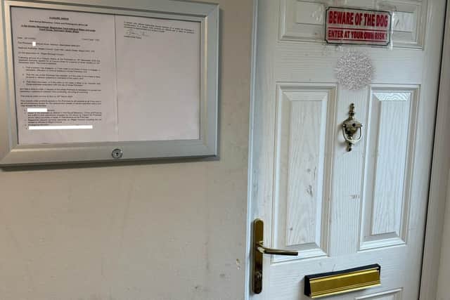 The closure order details are spelt out to any would-be visitors to the flat in Samuel Street, Atherton