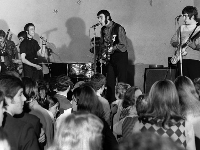 Local group "Harlem John's Reshuffle" on stage at Wigan Casino in the early 1970s.