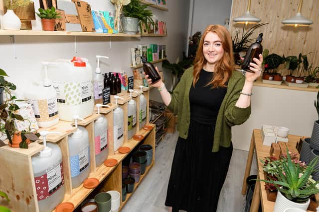 Owner of Little Pot Plants at her zero waste station with reusable containers. Photo: Kelvin Stuttard