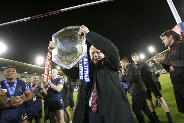 Warriors chairman Ian Lenagan celebrates with the League Leaders Shield at the Leigh Sports Village