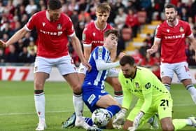 Chris Sze has become a regular in the Latics first-team squad this term