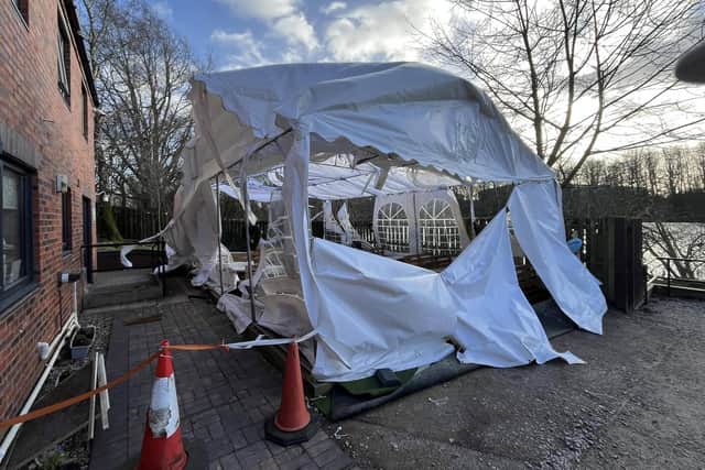 The Hamlet's precious marquee in tatters