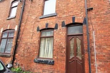 This mid terraced property is for sale at £90k