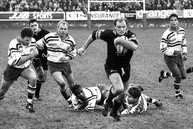 Orrell full-back Simon Langford races clear of the Bath cover including Jeremy Guscott, right, on his way to the try line in the Pilkington Cup round 5 match at Edge Hall Road on 28th of January 1995. 
Orrell lost 19-25.