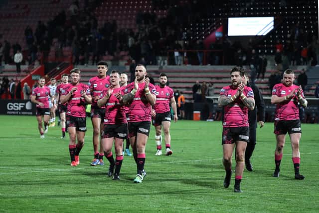 Wigan Warriors needed a late drop goal to beat Toulouse