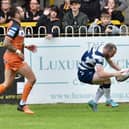 Liam Marshall marked his 100th Super League appearance with a brace, which included the 100th try of his career