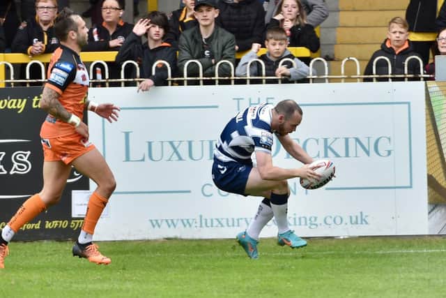 Liam Marshall marked his 100th Super League appearance with a brace, which included the 100th try of his career