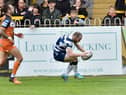 Liam Marshall marked his 100th Super League appearance with a brace, which included the 100th try of his career