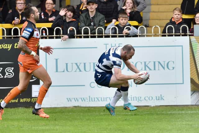 Liam Marshall marked his 100th Super League appearance with a brace, which included the 100th try of his career