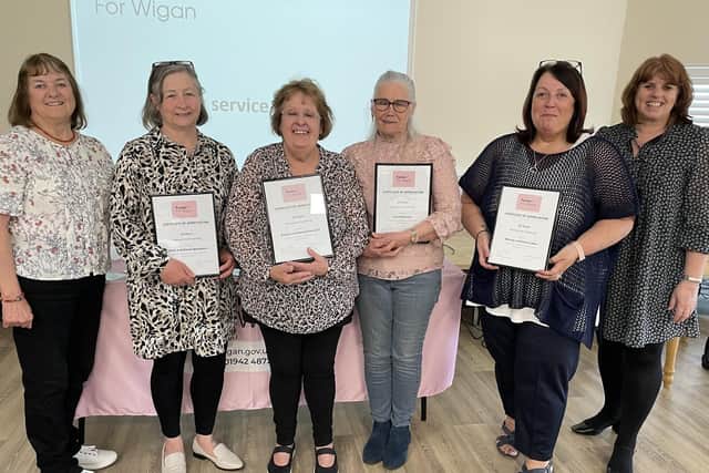 Foster carers with 15 years service recognition award.