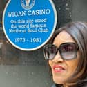 Gloria Jones at the blue plaque to the Wigan Casino site at Grand Arcades