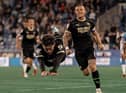 Callum Lang celebrates his late winning goal at Huddersfield