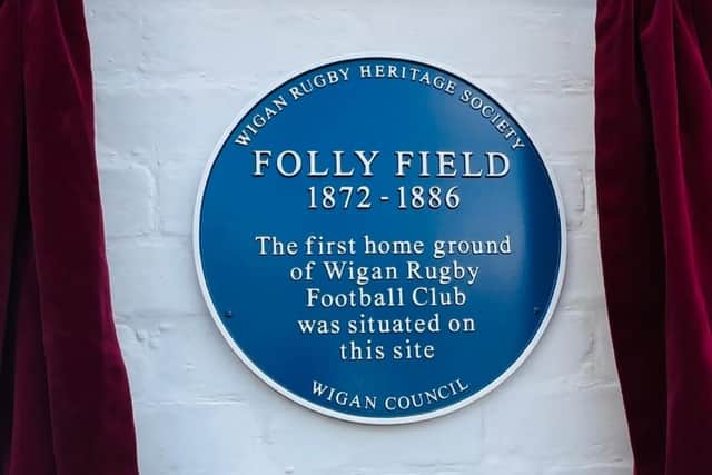 The plaque marks the land where Folly Field stood