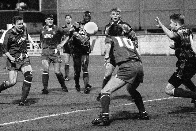 Wigan Athletic central defender Peter Skipper joins the attack and attempts to chip in against Huddersfield Town in the Autoglass Trophy northern semi-final at Springfield Park on Tuesday 23rd of February 1993.
Latics won 5-2 with Ray Woods getting a hat trick and Bryan Griffiths and Phil Daley scoring the others.