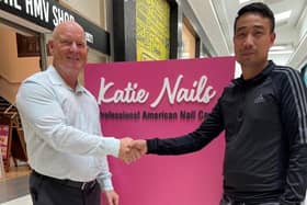 Mike Matthews, Grand Arcade centre manager (left) and Katie Nails manager Duy Dong Mac
