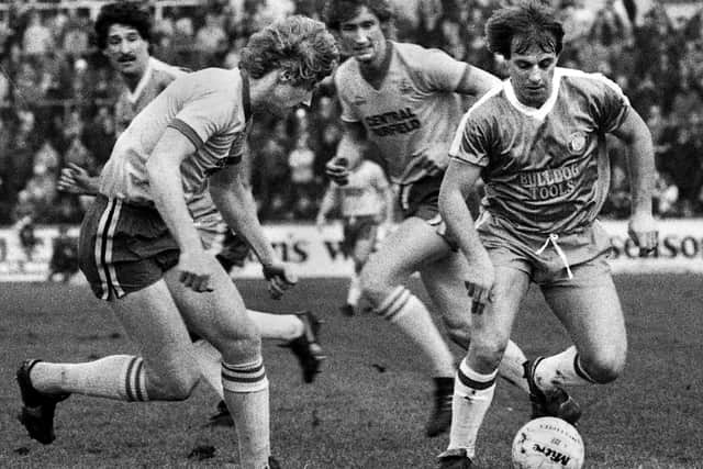 Wigan Athletic forward, Eamon O'Keefe, in control during the Division 3 match against Huddersfield Town at Springfield Park on Monday 3rd of January 1983.
David Lowe and Eamon O'Keefe got the goals as Latics won 2-0.