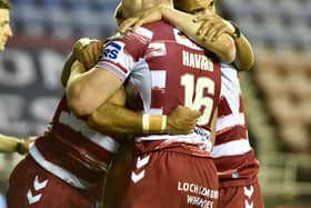 The Warriors celebrate Bevan French's first half try