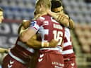 The Warriors celebrate Bevan French's first half try