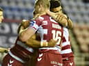 The Warriors celebrate Bevan French's first half try